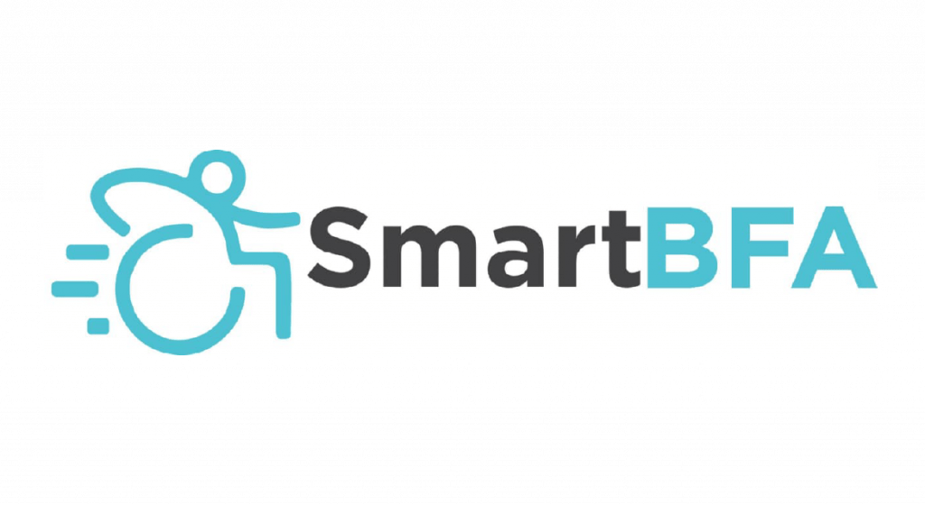 Logo of SmartBFA. The logo has a light blue graphic a wheelchair user on the left. On the right is the word Smart in black font and BFA in light blue font.