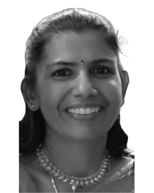 Black and white photo of Anusiah a/p Tharmalingam, she is smiling and has her hair partially tied back